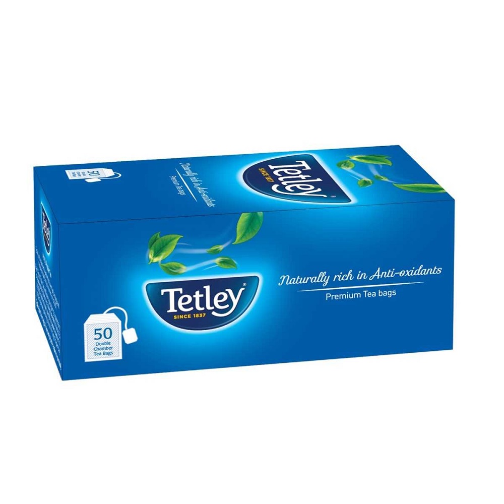 Чай Тетли. Чай Tetley since 1837 впакетах. Tetley Tea Folk Figurines. Picture of Green Tea Bags.